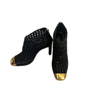 Authentic Hermes black woven booties with gold toe